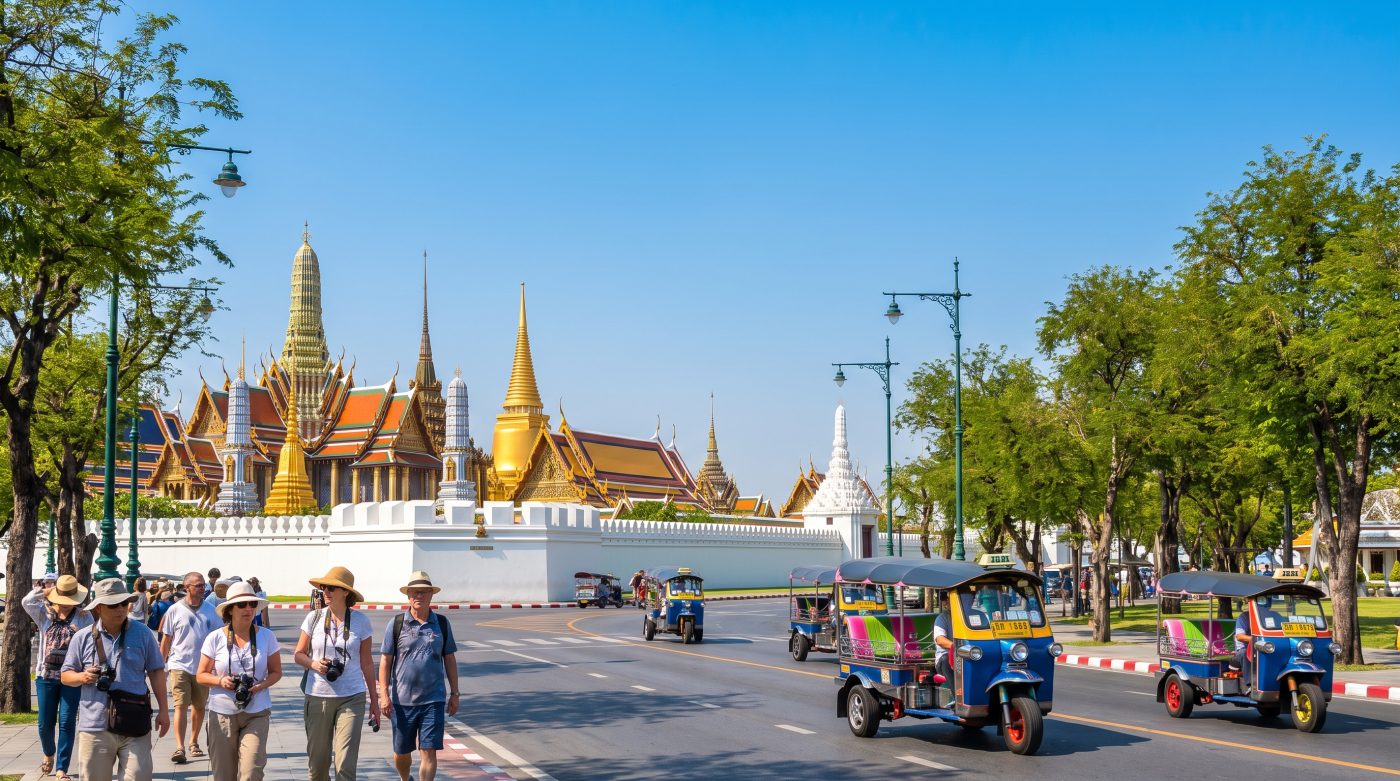 Golden temple spires and white palace walls near Bangkok's Grand Palace in the Old City