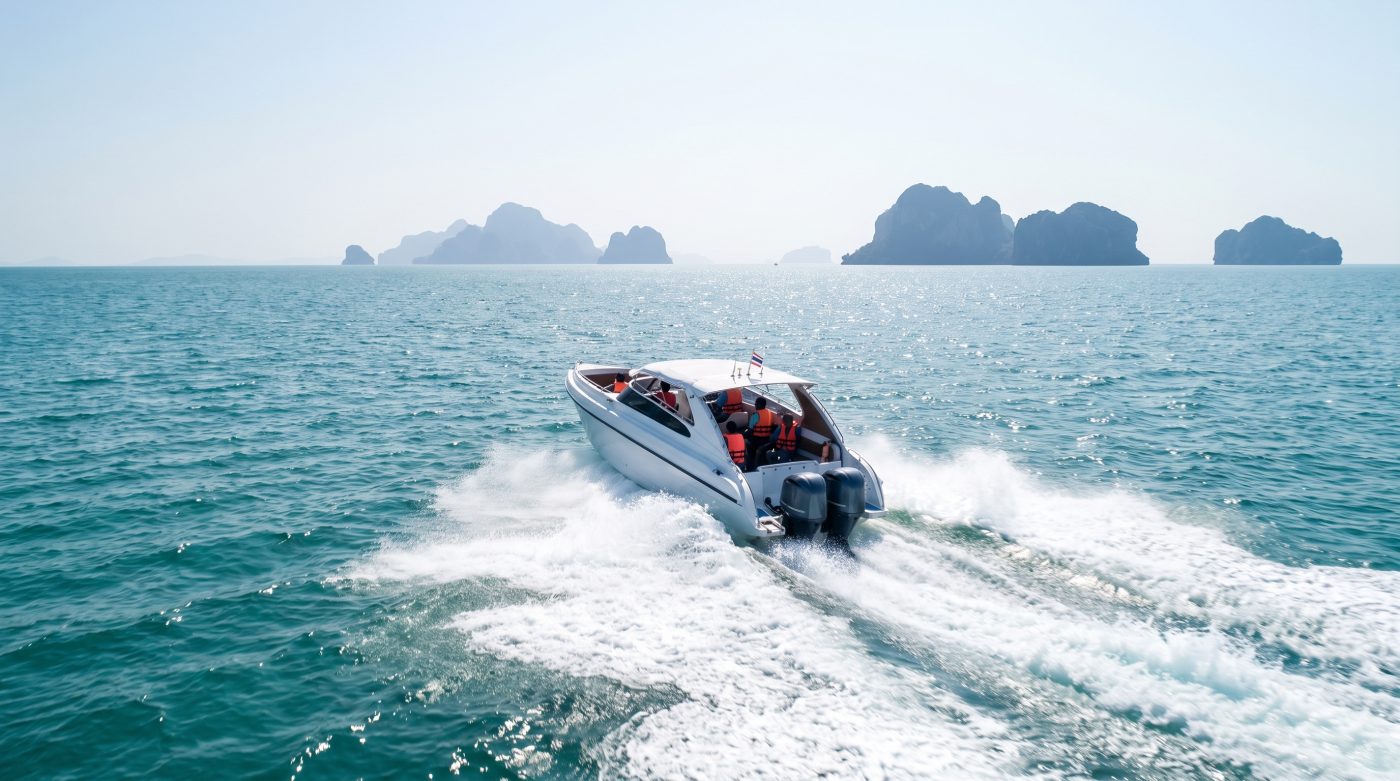 Speedboat crossing open water between Krabi and Phuket, Thailand